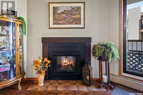 206 55 Wood Lily Drive, Moose Jaw, SK - Indoor Photo Showing Living Room With Fireplace