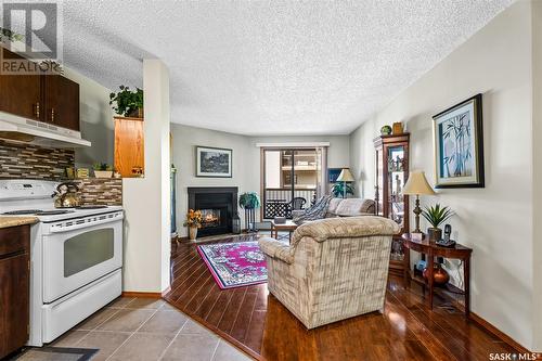 206 55 Wood Lily Drive, Moose Jaw, SK - Indoor With Fireplace