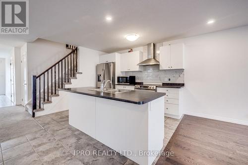 11 Shedrow Place, Kitchener, ON - Indoor Photo Showing Kitchen With Double Sink