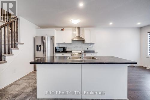 11 Shedrow Place, Kitchener, ON - Indoor Photo Showing Kitchen With Double Sink