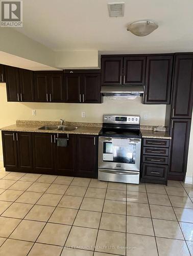 92 Olivia Marie Road W, Brampton, ON - Indoor Photo Showing Kitchen With Double Sink