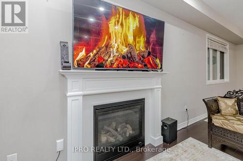 839 Whitlock Avenue, Milton, ON - Indoor Photo Showing Living Room With Fireplace