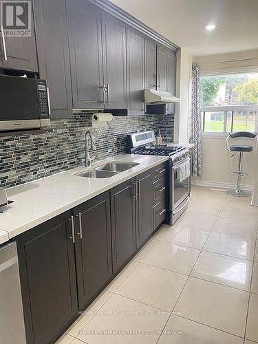 5 Kimbercroft Court, Toronto, ON - Indoor Photo Showing Kitchen With Double Sink