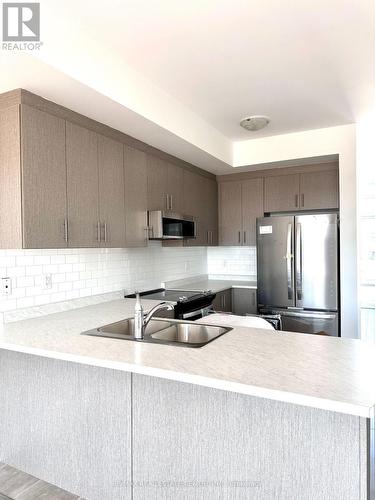 791 Heathrow Path, Oshawa, ON - Indoor Photo Showing Kitchen With Double Sink