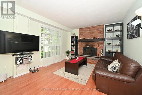 58 Lake Driveway E, Ajax, ON - Indoor Photo Showing Living Room With Fireplace