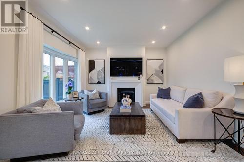 64 Ralph Chalmers Avenue, Markham, ON - Indoor Photo Showing Living Room With Fireplace