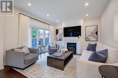 64 Ralph Chalmers Avenue, Markham, ON - Indoor Photo Showing Living Room With Fireplace