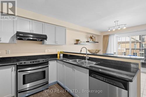 2564 Bur Oak Avenue, Markham, ON - Indoor Photo Showing Kitchen With Double Sink