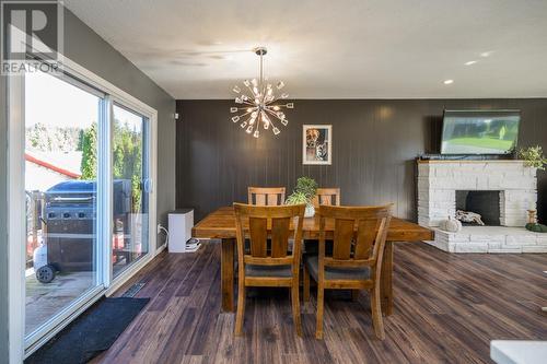 4266 Craig Drive, Prince George, BC - Indoor Photo Showing Dining Room With Fireplace