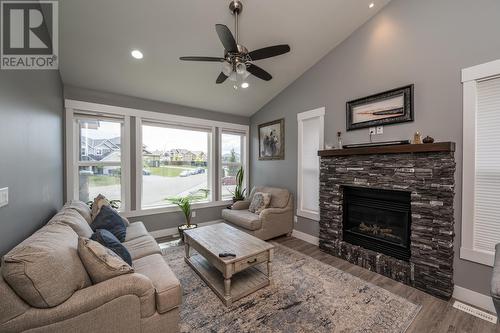 1218 Orizaba Court, Prince George, BC - Indoor Photo Showing Living Room With Fireplace