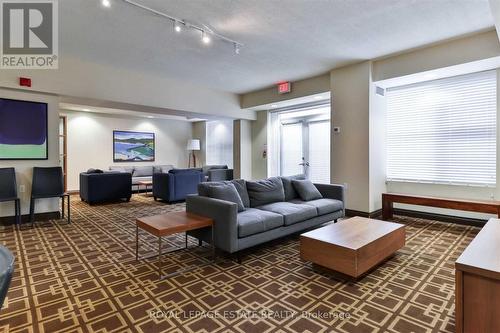 114 - 77 Mcmurrich Street, Toronto, ON - Indoor Photo Showing Living Room