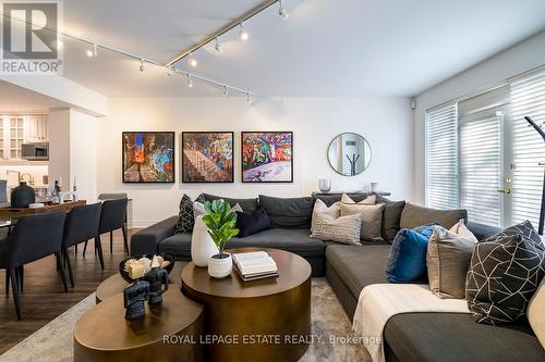 114 - 77 Mcmurrich Street, Toronto, ON - Indoor Photo Showing Living Room