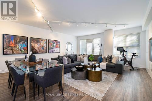 114 - 77 Mcmurrich Street, Toronto, ON - Indoor Photo Showing Living Room