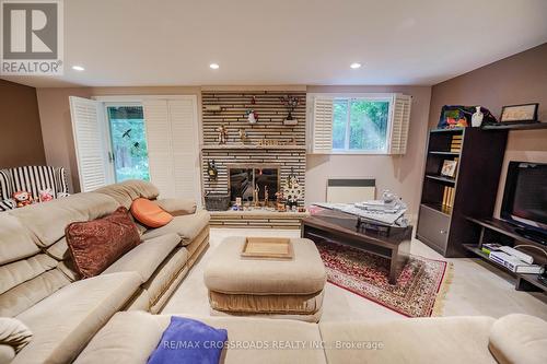 40 Harrington Crescent, Toronto, ON - Indoor Photo Showing Living Room With Fireplace