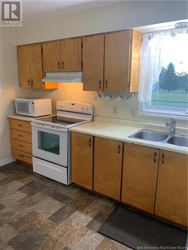 53 Rte 11 Hwy 11, Lower Newcastle, NB - Indoor Photo Showing Kitchen With Double Sink