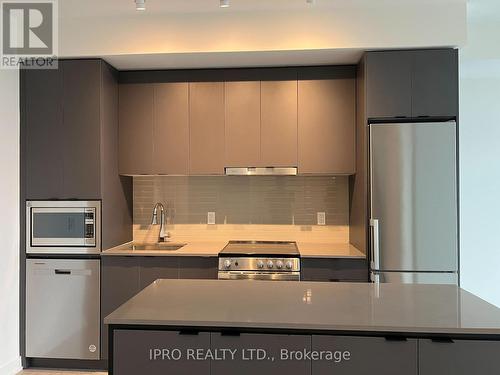 B1401 - 50 Upper Mall Way, Vaughan, ON - Indoor Photo Showing Kitchen With Stainless Steel Kitchen With Upgraded Kitchen