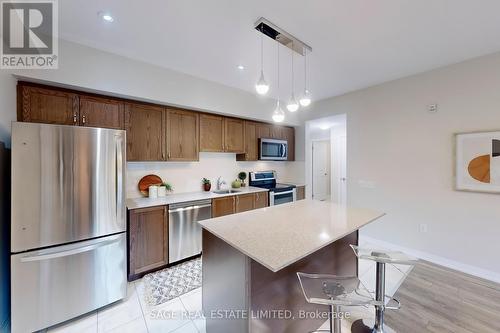 310 - 300 Essa Road, Barrie, ON - Indoor Photo Showing Kitchen With Stainless Steel Kitchen