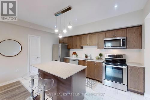 310 - 300 Essa Road, Barrie, ON - Indoor Photo Showing Kitchen With Stainless Steel Kitchen