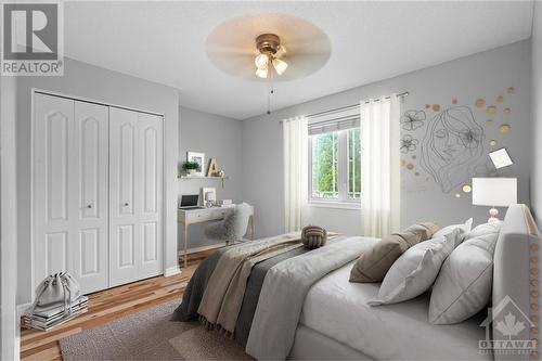 Image is virtually staged. Bedroom also features new hardwood flooring - 70 Lachaine Street, Embrun, ON - Indoor Photo Showing Bedroom