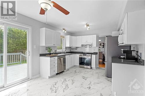 Upgraded tile (2023) and newer SS appliances (2022) - 70 Lachaine Street, Embrun, ON - Indoor Photo Showing Kitchen