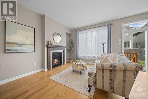 423 Warmstone Drive, Stittsville, ON - Indoor Photo Showing Living Room With Fireplace