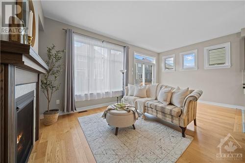 423 Warmstone Drive, Stittsville, ON - Indoor Photo Showing Living Room With Fireplace