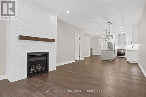 734 Clarence Street, Port Colborne, ON - Indoor Photo Showing Living Room With Fireplace