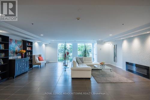 501 - 1421 Costigan Road, Milton, ON - Indoor Photo Showing Living Room With Fireplace