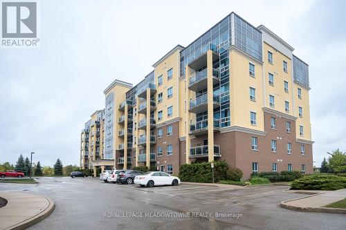 501 - 1421 Costigan Road, Milton, ON - Outdoor With Balcony With Facade