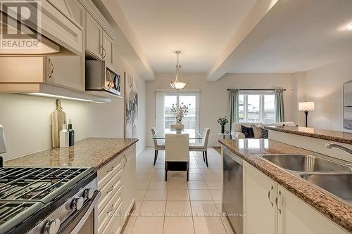 11 - 370 Stonehenge Drive, Hamilton, ON - Indoor Photo Showing Kitchen With Double Sink