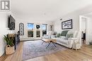 203 205 Mcintyre Street N, Regina, SK  - Indoor Photo Showing Living Room 