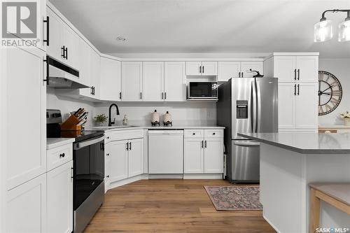 203 205 Mcintyre Street N, Regina, SK - Indoor Photo Showing Kitchen With Stainless Steel Kitchen