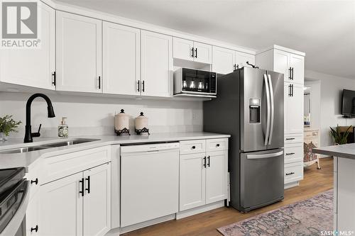 203 205 Mcintyre Street N, Regina, SK - Indoor Photo Showing Kitchen With Stainless Steel Kitchen With Double Sink