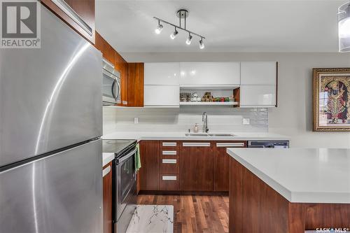 110 2007 Pohorecky Crescent, Saskatoon, SK - Indoor Photo Showing Kitchen With Stainless Steel Kitchen With Double Sink With Upgraded Kitchen