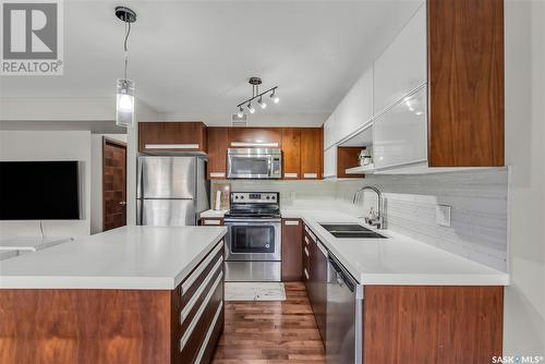 110 2007 Pohorecky Crescent, Saskatoon, SK - Indoor Photo Showing Kitchen With Stainless Steel Kitchen With Double Sink With Upgraded Kitchen