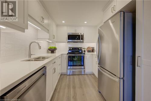 139 Father David Bauer Drive Unit# 434, Waterloo, ON - Indoor Photo Showing Kitchen With Double Sink With Upgraded Kitchen