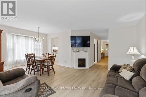 23 Wilmot Young Place, Brockville, ON - Indoor Photo Showing Living Room With Fireplace