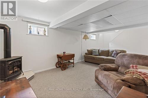 23 Wilmot Young Place, Brockville, ON - Indoor Photo Showing Basement With Fireplace