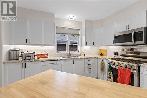 23 Wilmot Young Place, Brockville, ON - Indoor Photo Showing Kitchen With Double Sink