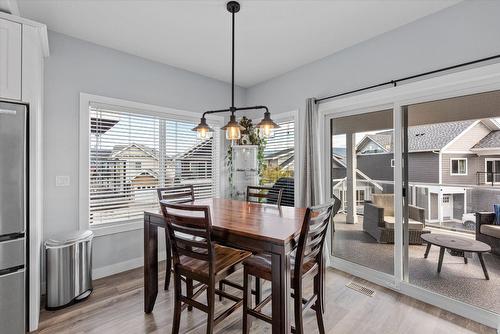 410-6956 Terazona Loop, Kelowna, BC - Indoor Photo Showing Dining Room