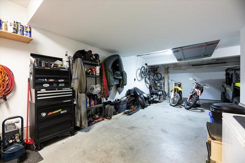 410-6956 Terazona Loop, Kelowna, BC - Indoor Photo Showing Garage