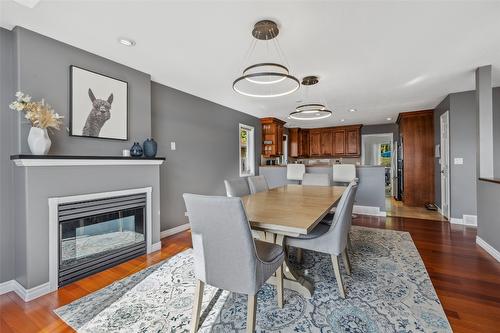 2624 Wild Horse Drive, West Kelowna, BC - Indoor Photo Showing Dining Room With Fireplace