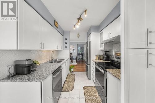 617 - 238 Bonis Avenue, Toronto, ON - Indoor Photo Showing Kitchen With Double Sink With Upgraded Kitchen