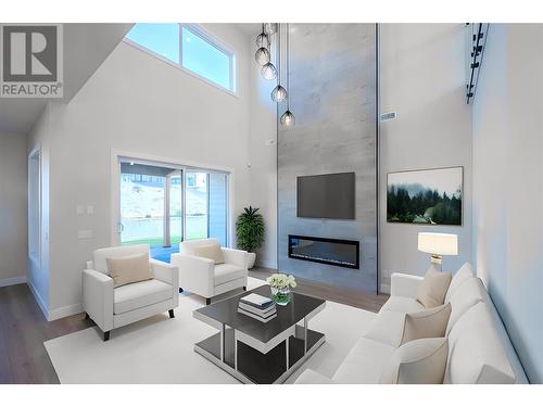 1121 Antler Drive, Penticton, BC - Indoor Photo Showing Living Room With Fireplace