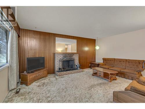 2737 15Th Avenue, Prince George, BC - Indoor Photo Showing Living Room With Fireplace