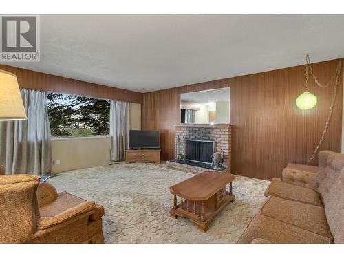 2737 15Th Avenue, Prince George, BC - Indoor Photo Showing Living Room With Fireplace