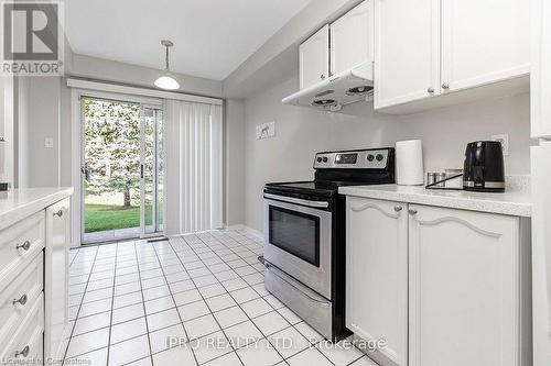 2555 Thomas Street Unit# 112, Mississauga, ON - Indoor Photo Showing Kitchen