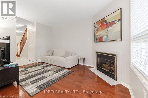 2555 Thomas Street Unit# 112, Mississauga, ON - Indoor Photo Showing Living Room With Fireplace