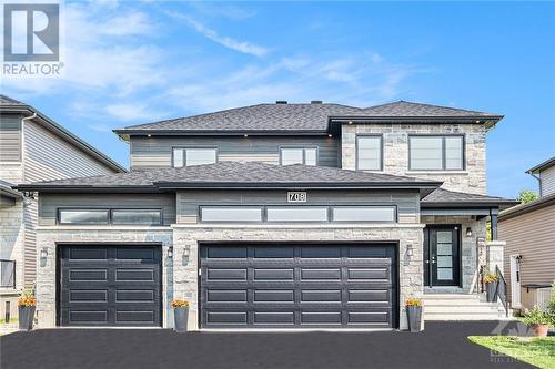 This stunning turnkey home sets a new standard for modern living, perfect for entertaining, relaxing and escaping the everyday. - 708 Geneva Crescent, Embrun, ON - Outdoor With Facade