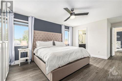 The primary bedroom is a true sanctuary, offering a peaceful retreat at the end of the day. This spacious room is designed for comfort and relaxation, with ample space for a king-sized bed. The ro - 708 Geneva Crescent, Embrun, ON - Indoor Photo Showing Bedroom